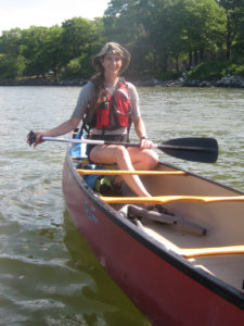 Julie in a canoe.